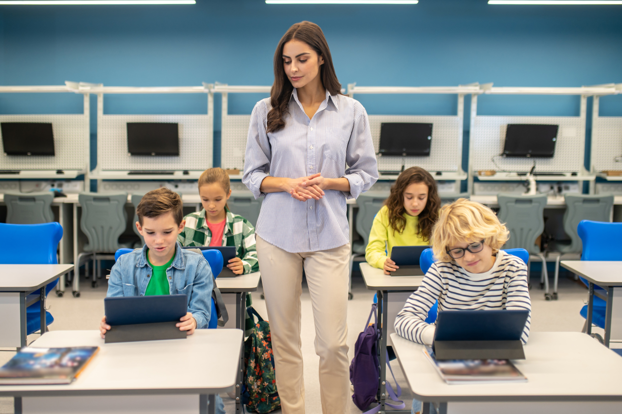 Students working on tablets in a smart classroom